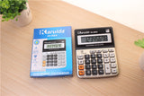 Karuida calculator and its packaging on a wooden surface with plants.